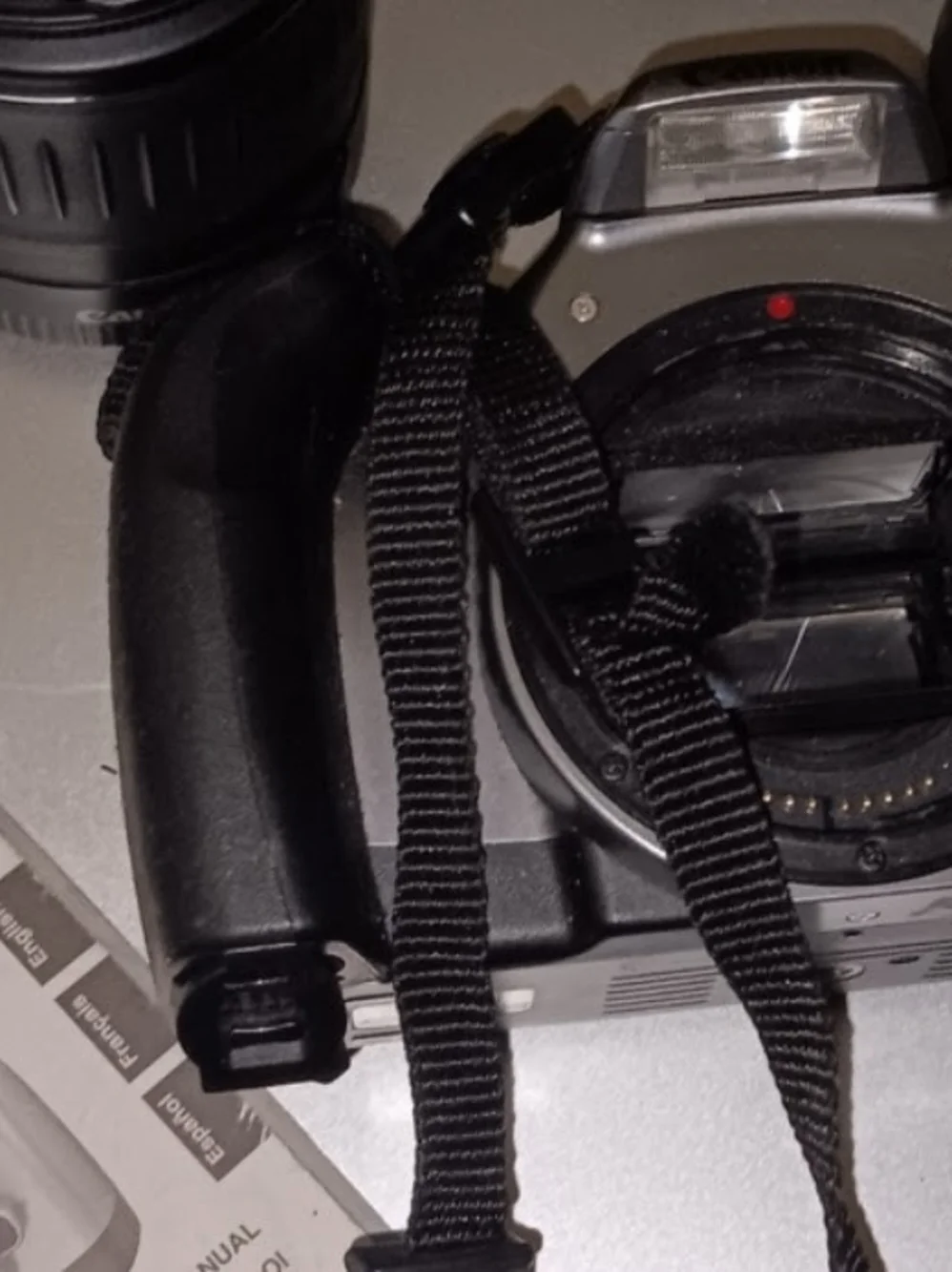 Canon DSLR Camera Body in Gray with Blue and Red Strap